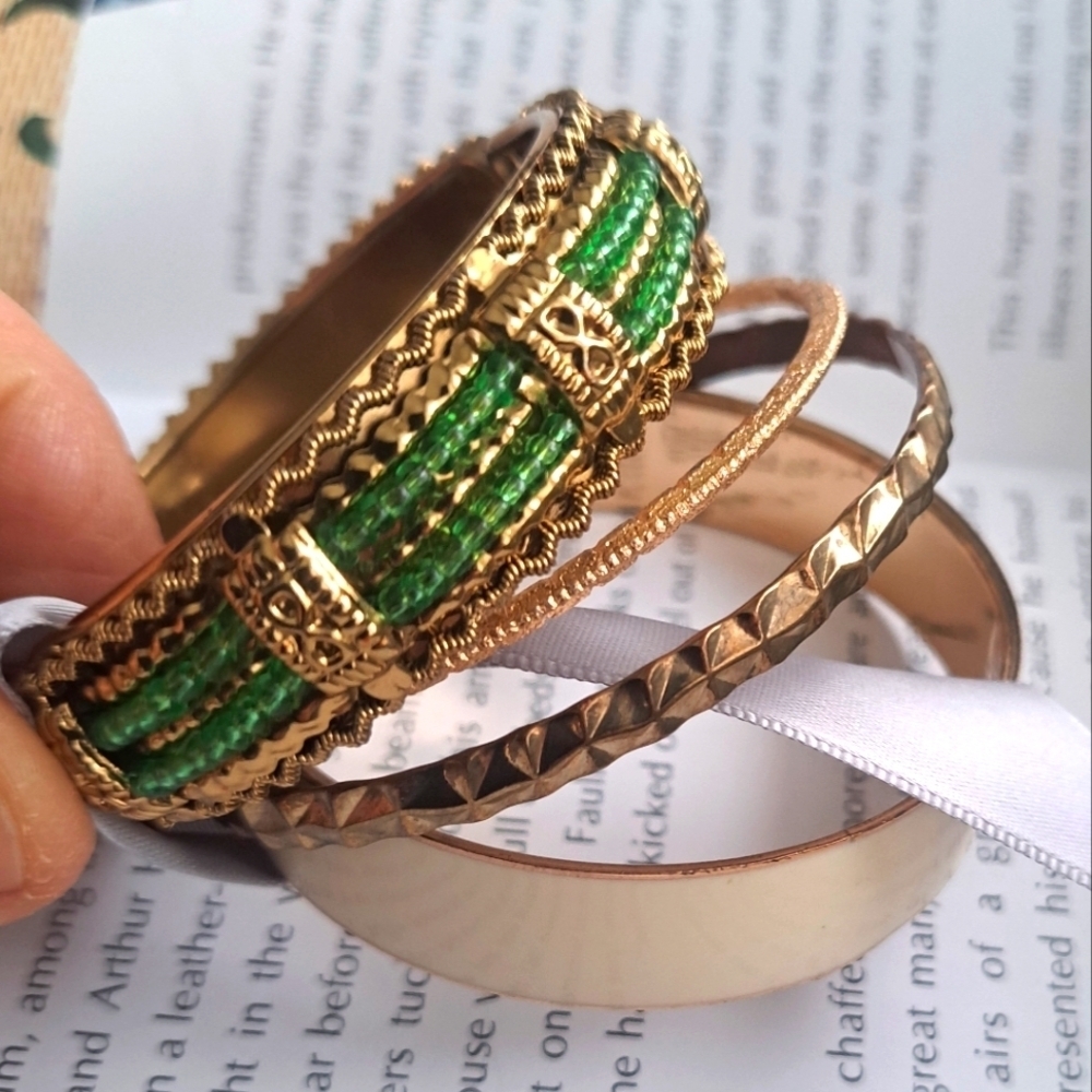 Set of 4 beautiful green cream and gold bracelets